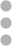Vertical stack of four gray dots suggesting a 'more options' menu.