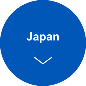 Blue circular button labeled Japan with a downward chevron, indicating a country dropdown selector