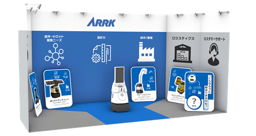 ARRK trade show booth with a blue backdrop, product demos, and information panels text and signs.